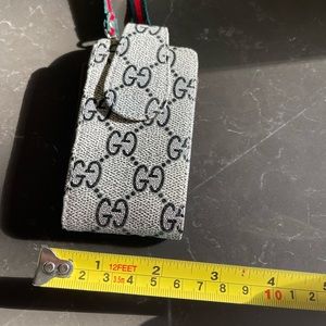 Gucci holder with strap. Perfect for chapsticks, or hand sanitizer